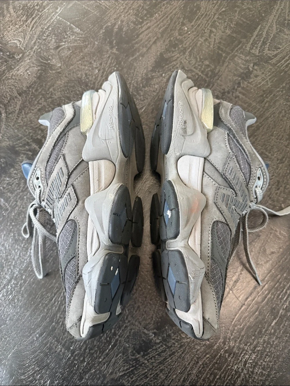New Balance 9060 Gray Sneakers with Blue Logo Accents